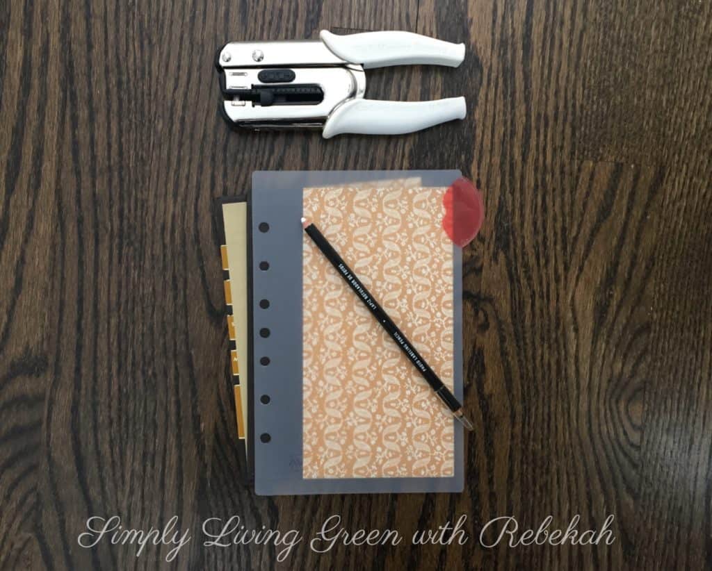 Then, using your 3-hole punch, create a template for where your holes will be in the cover and filler paper.